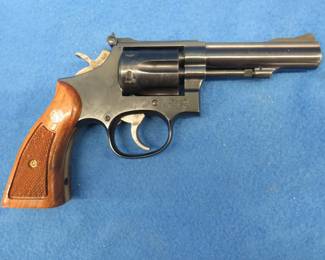 Lot 14. Smith & Wesson Model 17-4 double-action .22 revolver. SN BEB0730. Includes original box.
