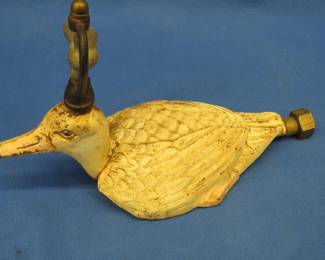 Lot 112. Antique cast iron painted duck sprinkler with brass fittings, no markings found on casting
