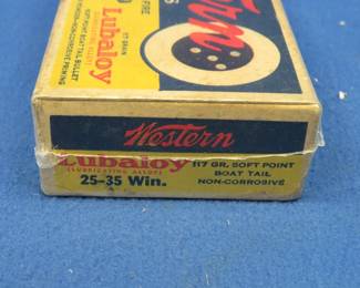 Lot 128. 20 Western 25-35 Winchester rounds in a personally sealed vintage box that is in good condition