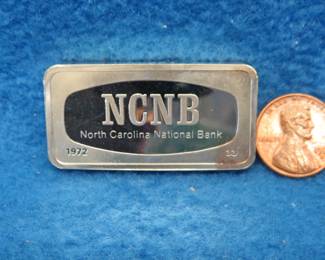 Lot 284. Franklin Mint Bank-marked sterling silver ingot. 65.42 grams.