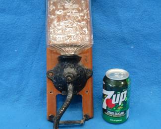 Lot 234. Arcade Jewel coffee grinder mounted on a board