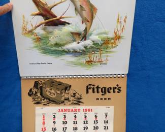 Lot 358. 1961 Fitger's Beer vacuum formed advertising calendar topper with a complete calendar.