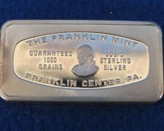 Lot 380. Franklin Mint Bank-marked sterling silver ingot. 65.57 grams.