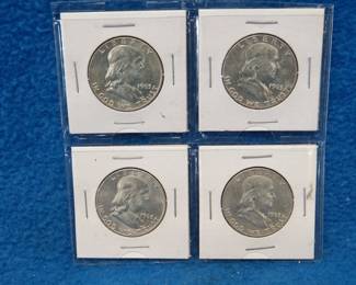 Lot 91. Four 1963 D Franklin silver half dollars