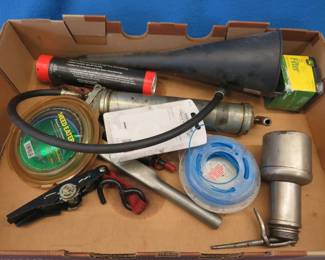 Lot 278. Grease gun, funnel, John Deere oil filter, and more