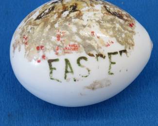 Lot 275. Milk glass painted easter egg