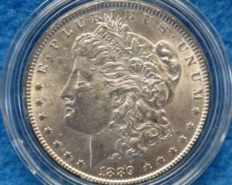 Lot 176. 1889 P Morgan silver dollar from a boxed set. All coins from this set are being sold individually in this auction.