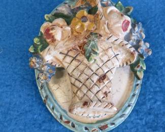 Lot 199. Cast iron flower basket door knocker