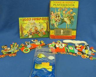 Lot 197. Children's books and a vintage Disney cardboard wall decoration