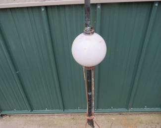 Lot 72. Antique lightning rod with intact glass ball. 72" tall.