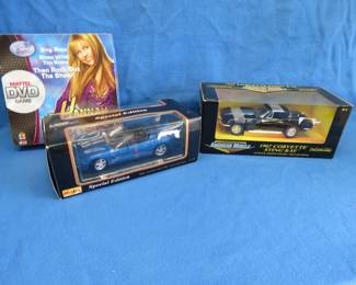 Lot 222. Hannah Montana game. Maisto 1998 Corvette Convertible 1:18. AM Muscle 1967 Corvette Stingray 1:18.