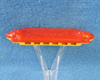 Lot 188. Magnus toy circus band harmonica.