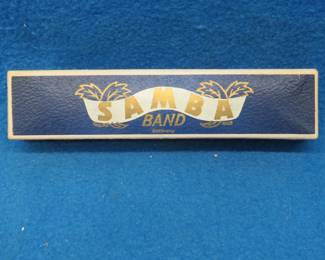 Lot 344. Josef Fischer Samba Band tremolo 40-hole harmonica in the key of C. Sounds great. Excellent condition.