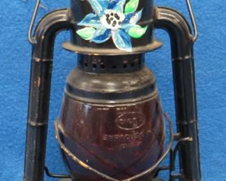 Lot 333. Dietz "Little Giant" lantern with original red Dietz "Little Wizard" globe