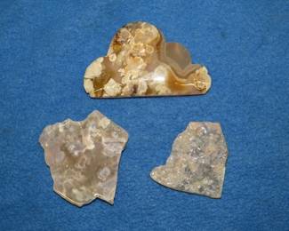 Lot 350. Two Flower Agate slices and a Flower Agate Cloud Carving. Total weight 40 lb.