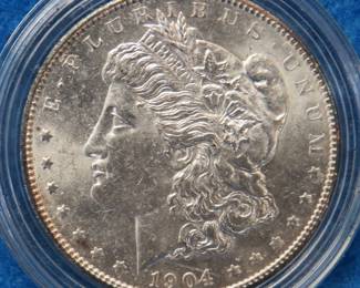 Lot 229. 1904 O Morgan silver dollar: All coins from this set are being sold individually in this auction.