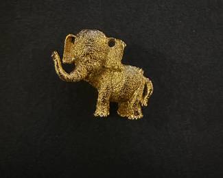 1980s golden elephant pin
