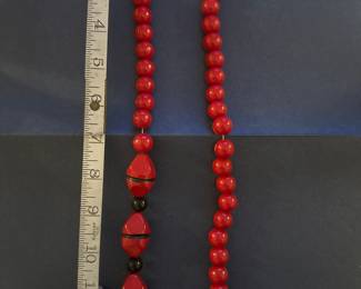Vintage asymmetrical, red wood beaded necklace