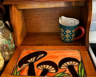 Bread box when it’s opened, with cute mushroom stained glass
