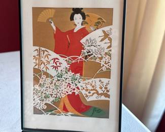 framed print depicting a Japanese Geisha 