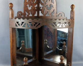 Ornate Wooden Corner Shelf with Mirrored Backs