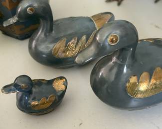 Brass and bronze ducks