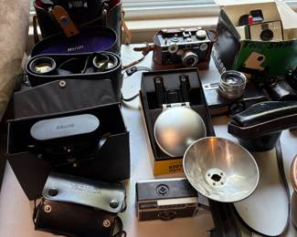 Vintage cameras and binoculars