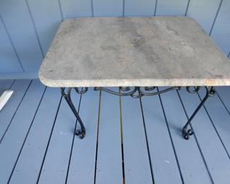 Wrought iron heavy marble-top table