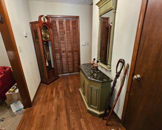 Baldwin Grandfather Clock, walking canes, entryway table and mirror