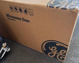 NIB GE mcirowave