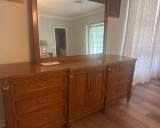 Real wood vintage dresser with mirror.  Part of a matching set of bedroom furniture -6 pieces total 