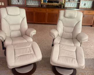 Swivel recliners with ottomans