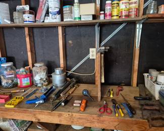 Tools, jars of hardware, nails