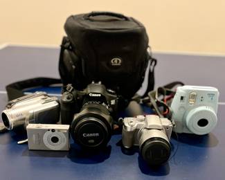 Instax mini, Canon EOS, Panasonic camcorder and camera, Canon PowerShot 