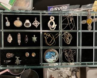 Sterling silver and 14K gold jewelry.