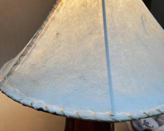 Sidetable/Lamp. Handcrafted by homeowner. Wood base and lampshade made from hide. L-27, W-23, H-63 Available for presale. Text Sara at (407) 448-3093.
