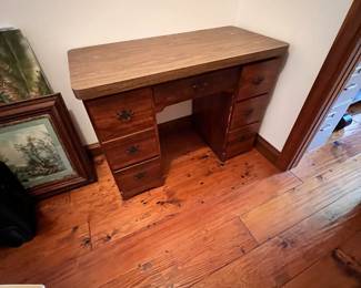 Wooden desk with 7 drawers. L-43, W-21, H-31. Available for presale. Text Sara at (407) 448-3093.