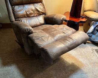 Leather reclining chair. L-37, W-43, H-44. Available for presale. Text Sara at (407) 448-3093.