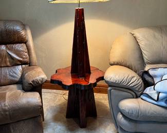 Sidetable/Lamp. Handcrafted by homeowner. Wood base and lampshade made from hide. L-27, W-23, H-63 Available for presale. Text Sara at (407) 448-3093.