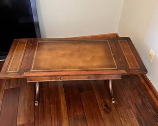 Expandable table. L-34 and 48, W-21, H-17. Available for presale. Text Sara at (407) 448-3093.