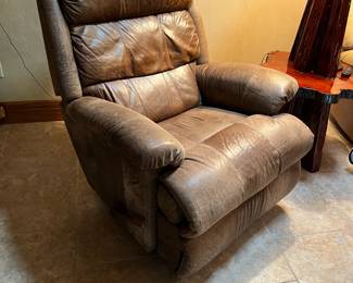 Leather reclining chair. L-37, W-43, H-44. Available for presale. Text Sara at (407) 448-3093.