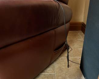 Leather massage chair. L-38, W-42, H-47. Available for presale. Text Sara at (407) 448-3093.