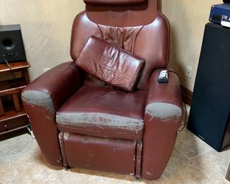 Leather massage chair. L-38, W-42, H-47. Available for presale. Text Sara at (407) 448-3093.