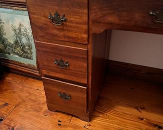 Wooden desk with 7 drawers. L-43, W-21, H-31. Available for presale. Text Sara at (407) 448-3093.