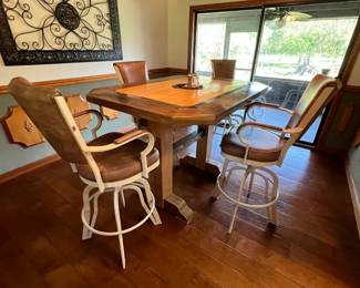 Bistro table. Handcrafted by homeowner. L: 61 inches, W: 44 inches, H: 43 inches. Table & barstools available for presale. Text Sara at (407) 448-3093.