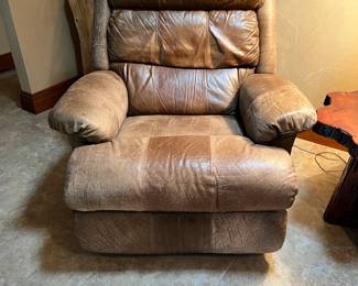 Leather reclining chair. L-37, W-43, H-44. Available for presale. Text Sara at (407) 448-3093.