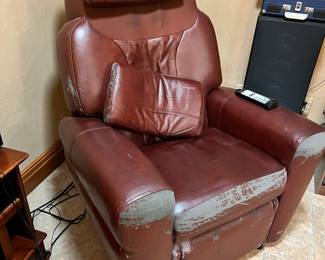 Leather massage chair. L-38, W-42, H-47. Available for presale. Text Sara at (407) 448-3093.