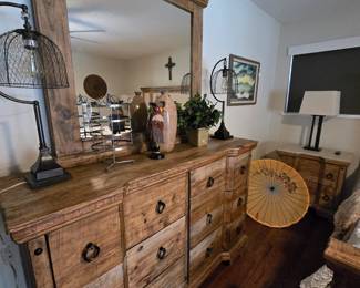 This dresser is part of the primary bedroom California King set.  A variety of decorative lamps and home decor available 