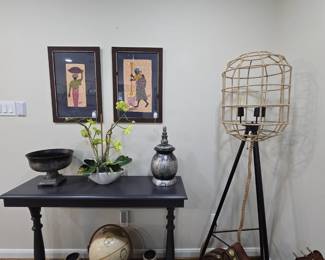 Lots of wall art and home decor as shown.  Large assortment of lamps, tables, occasional chairs, and decorative pillows