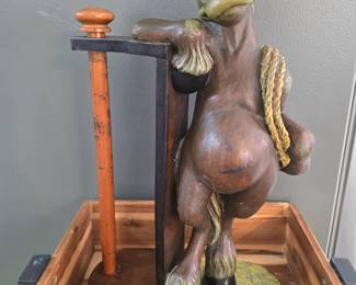 How about a whimsical horse paper towel holder? We named him Charlie :-)
